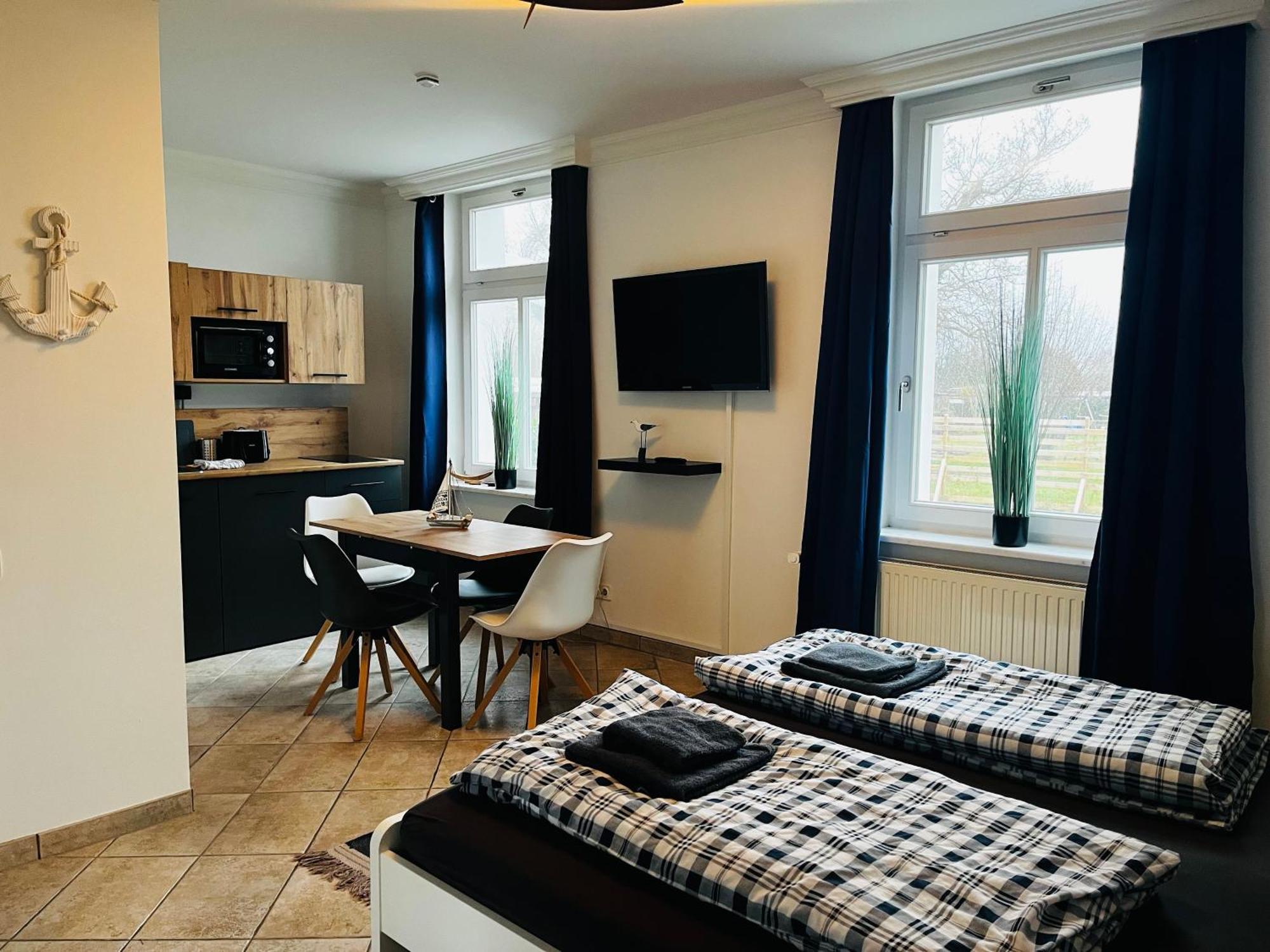 Kapitaenshaus An Der Warnow Mit Sauna Guest house Rostock